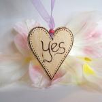 YES - a loving wooden heart answers....